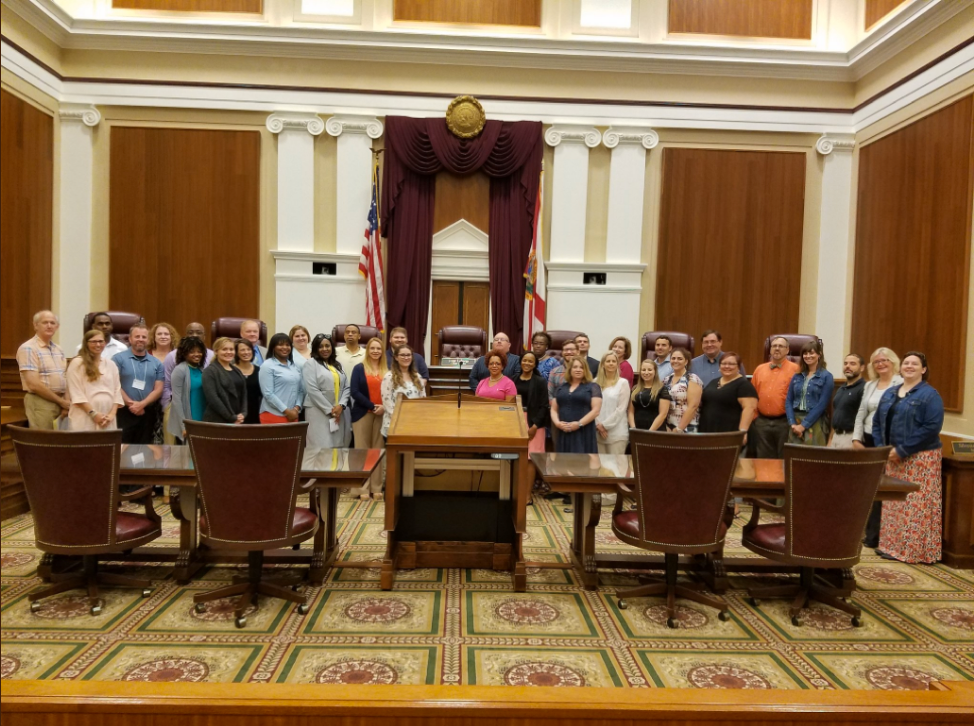 JMLP Florida Summer Institute participants in the Florida Legislature Committee Hearing Room where they conducted their simulated congressional hearing JMLP Florida Summer Institute participants in the Florida Legislature Committee Hearing Room where they conducted their simulated congressional hearing